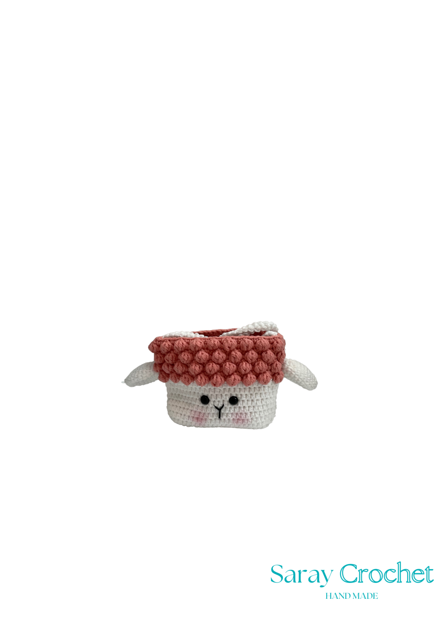 Handmade crochet sheep with a pink hat on a white background, branded 'Saray Crochet'.