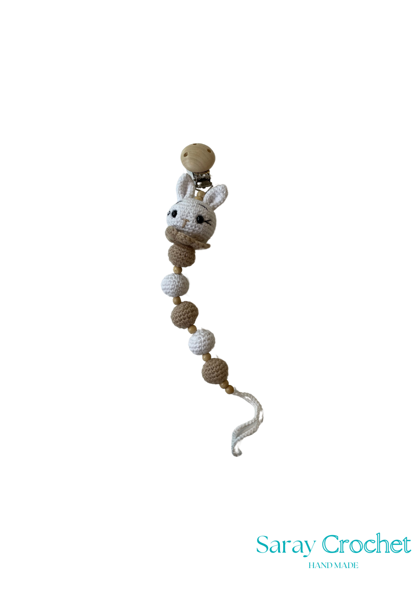 Crocheted baby rattle with bunny design on a white background, branded 'Saray Crochet'.