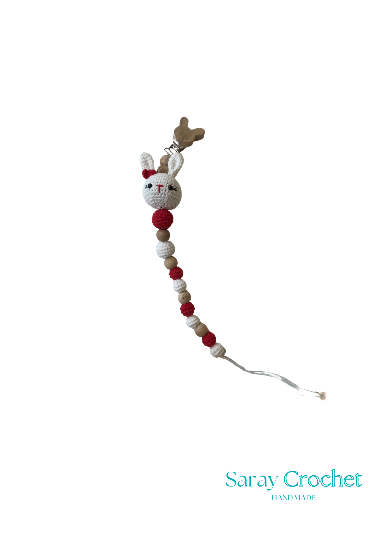 Crocheted bunny with beads on a white background, branded 'Saray Crochet'.