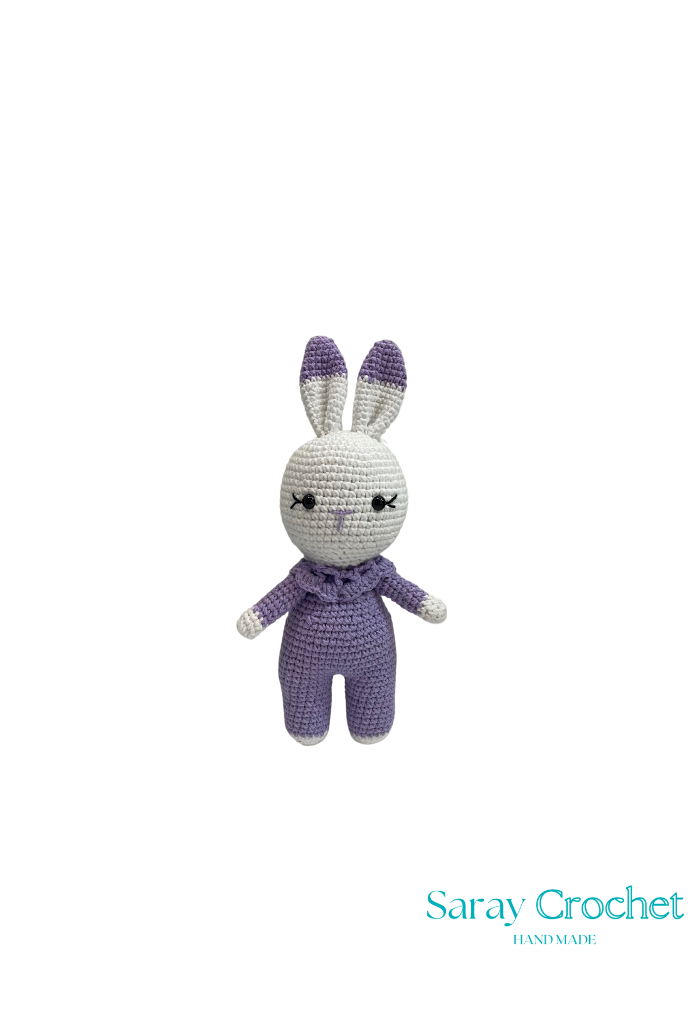 Crocheted rabbit toy in purple and white on a white background