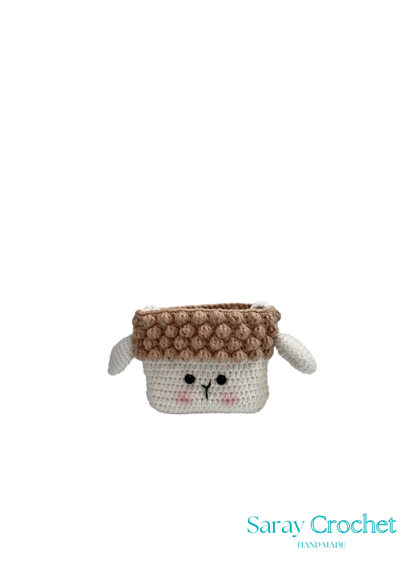 Handmade crochet sheep-shaped basket with a textured brown top on a white background, branded 'Saray Crochet'.