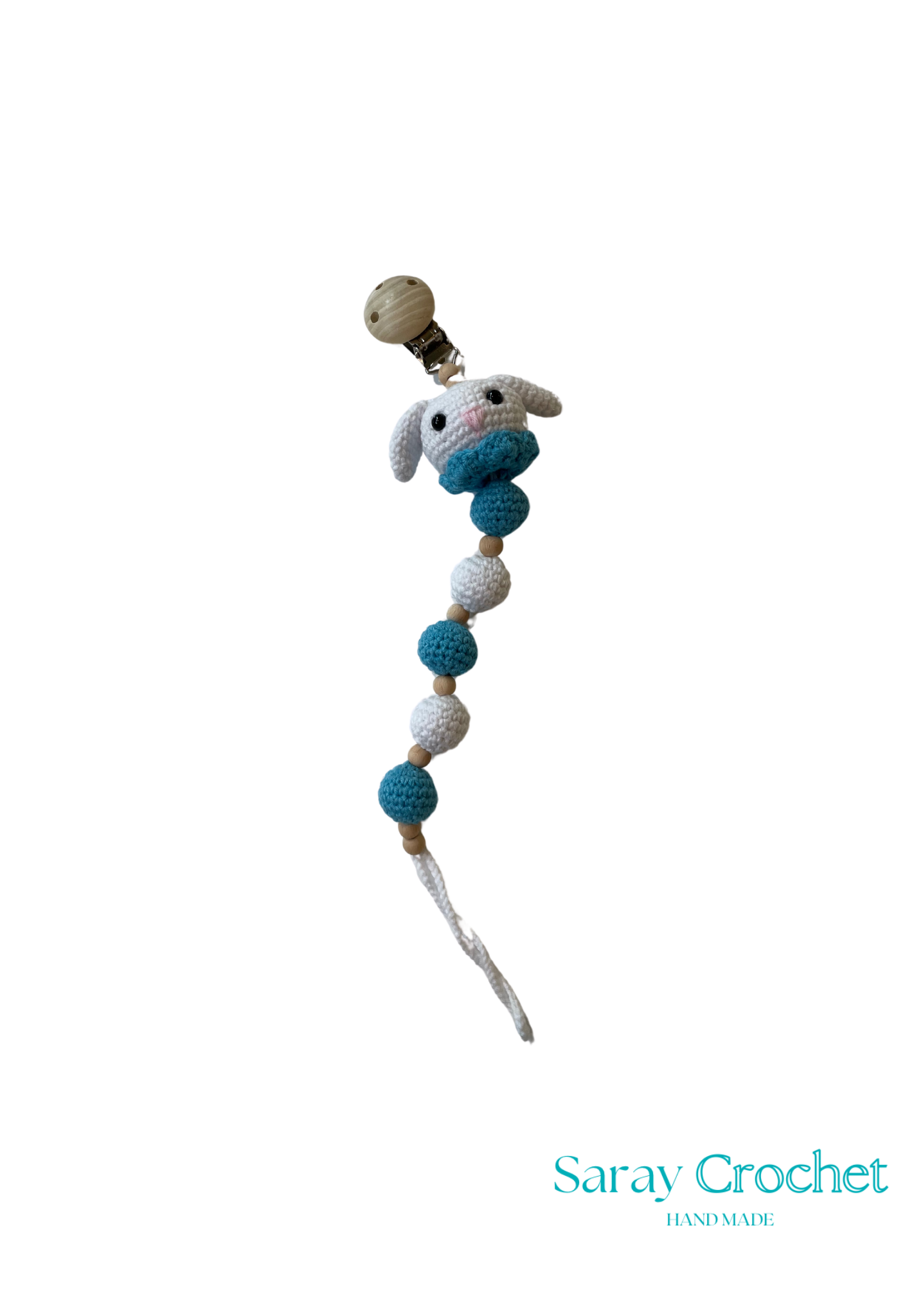 Crocheted toy with beads on a stick, branded 'Saray Crochet', on a white background