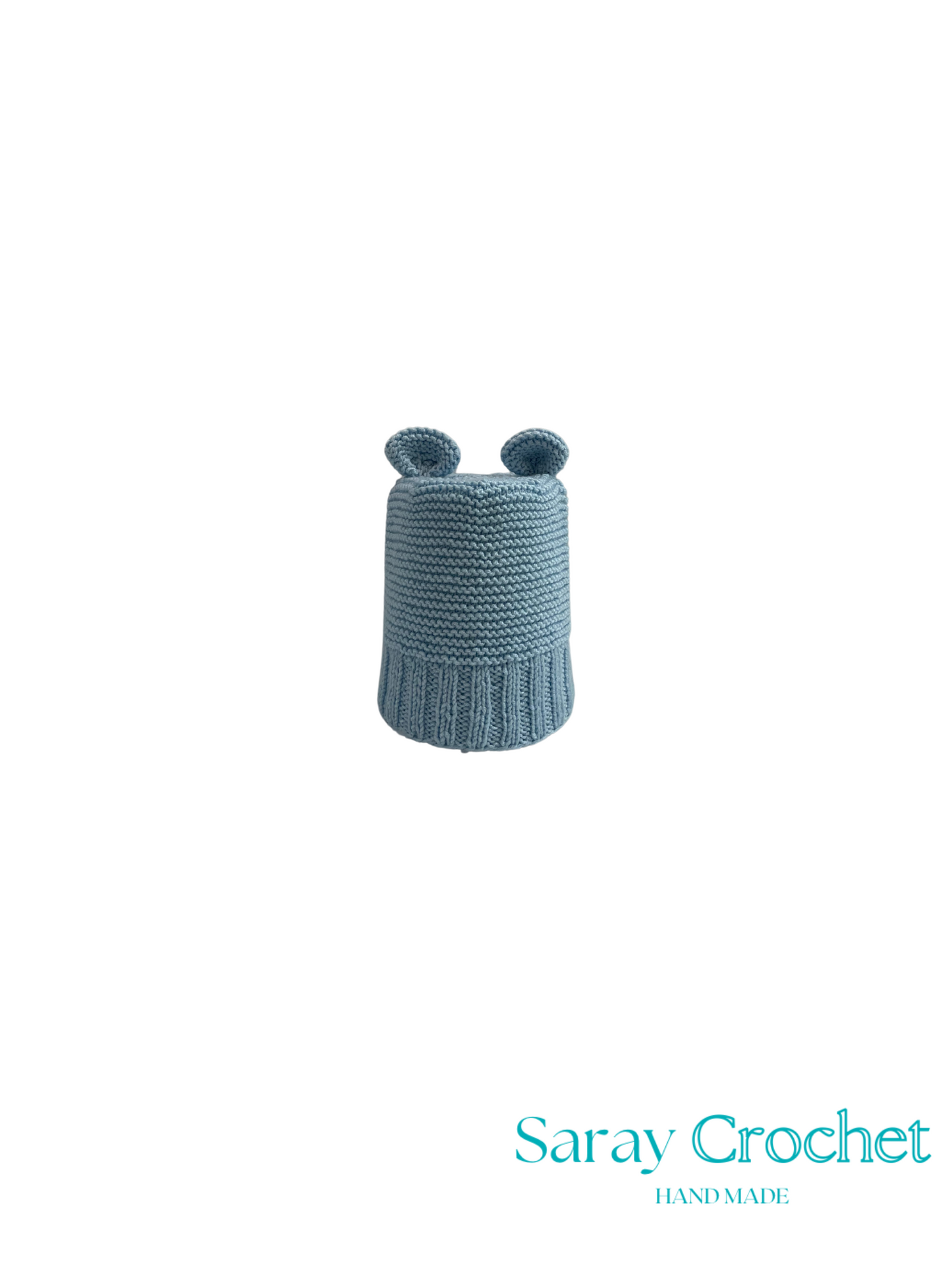 Knitted blue hat with ear-like embellishments on a white background, branded 'Saray Crochet'.