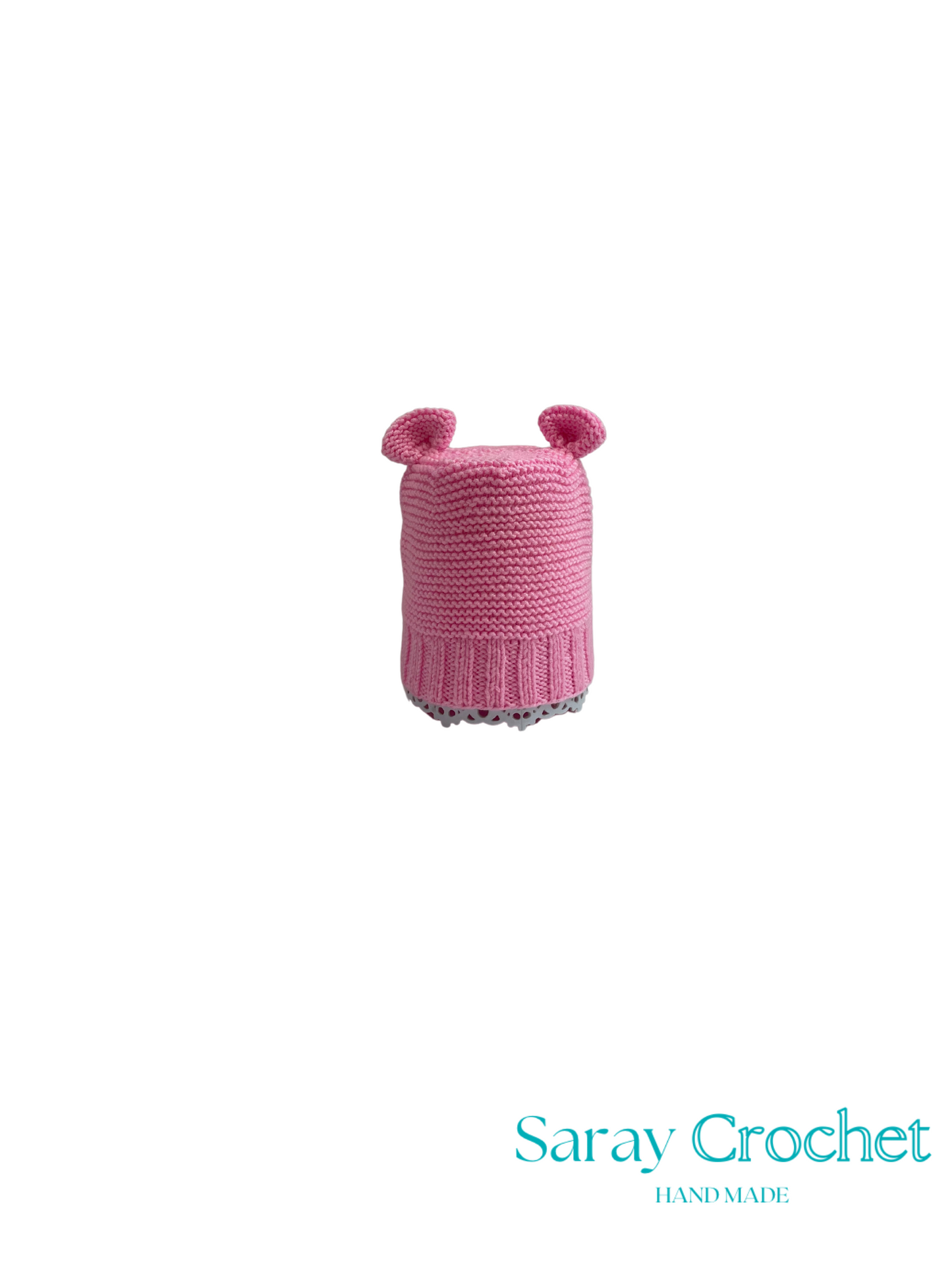 Pink knitted hat with bear ears on a white background, branded 'Saray Crochet'.