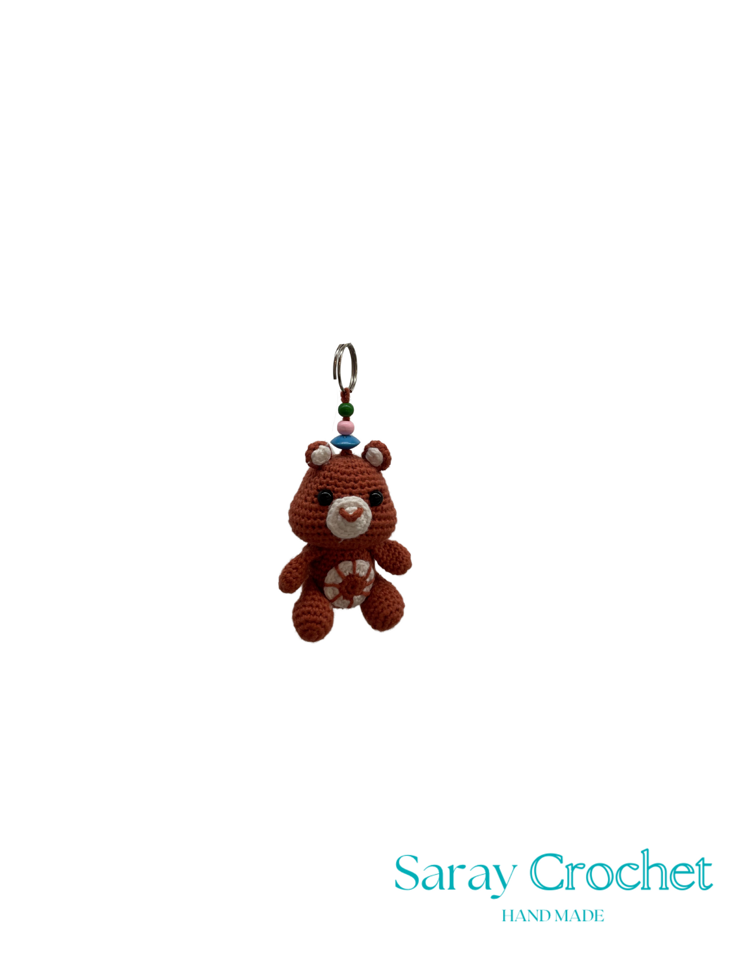 Brown teddy bear keychain with a white background and 'Saray Crochet' branding.