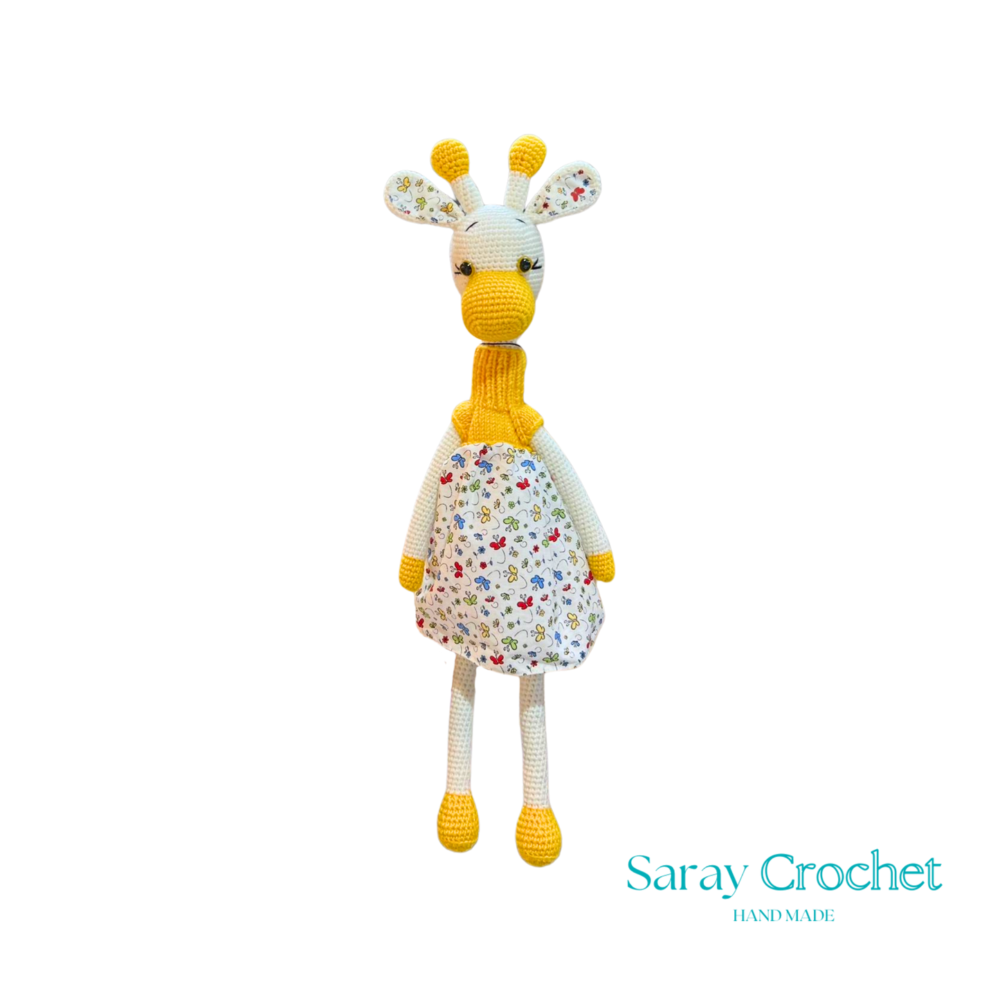Handmade plush giraffe toy with a floral dress and a friendly face, part of the SarayCrochet collection.