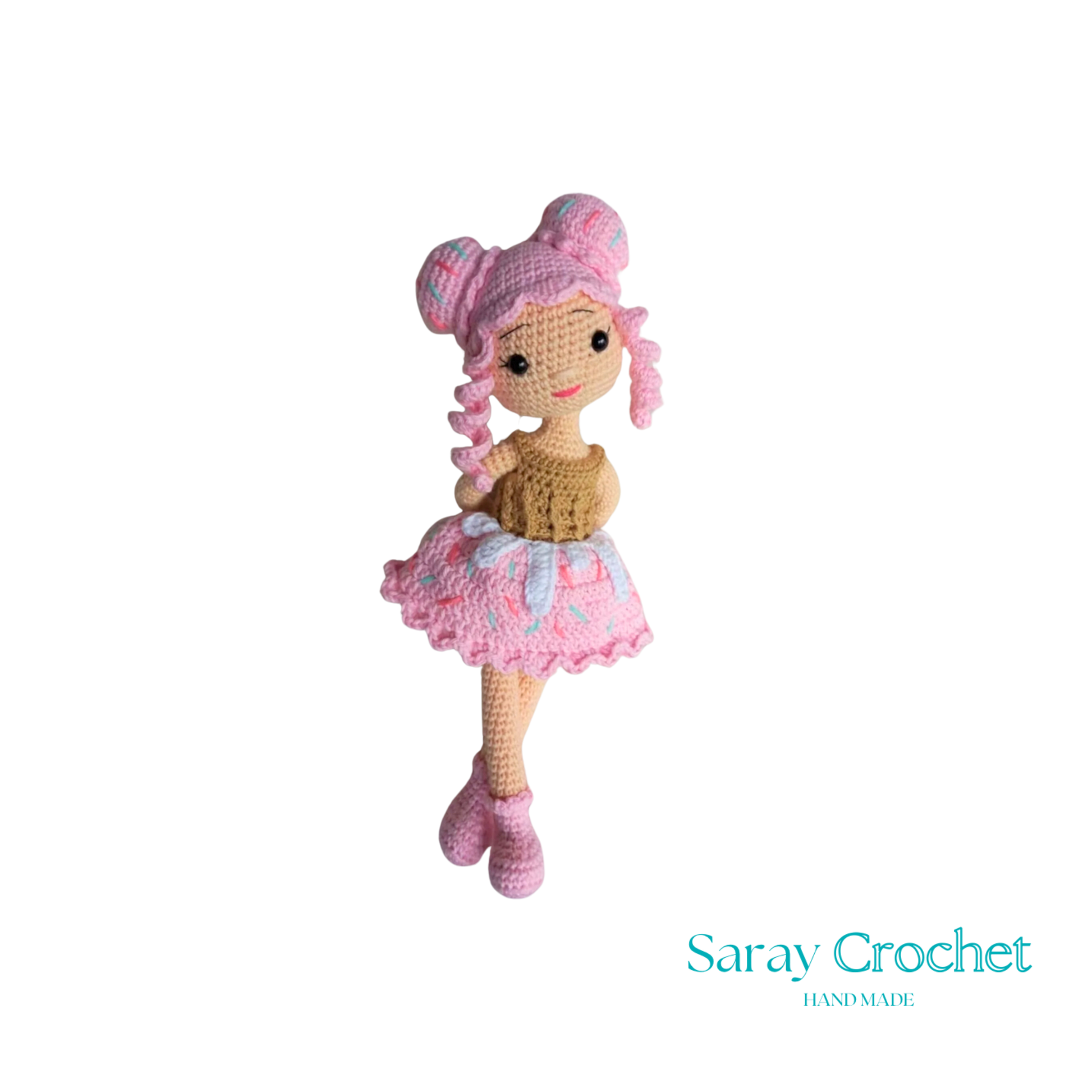 Handmade doll with a cupcake design, featuring a pink dress and matching hat.