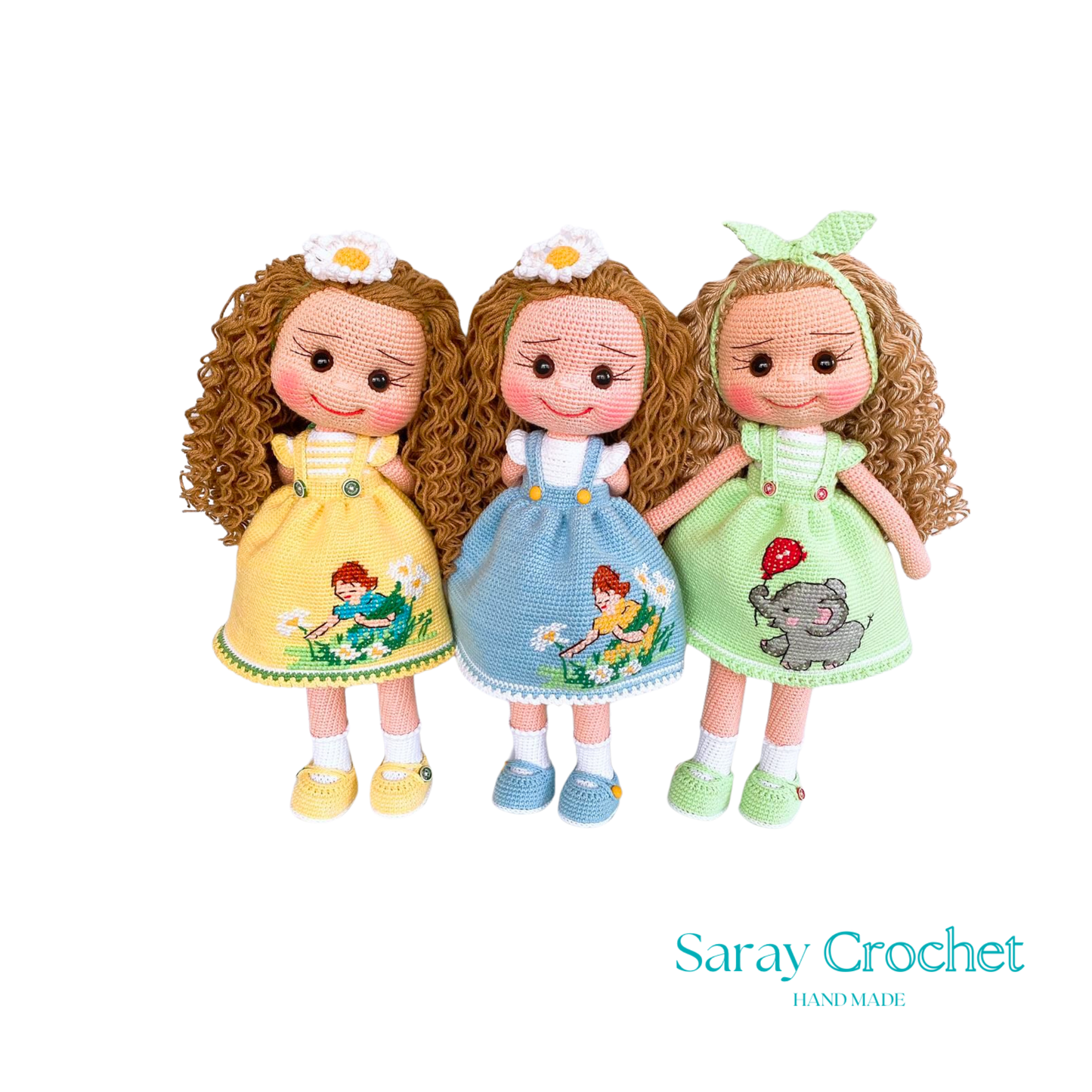 Three handcrafted dolls with curly hair, each wearing a uniquely designed dress in yellow, blue, and green colors.
