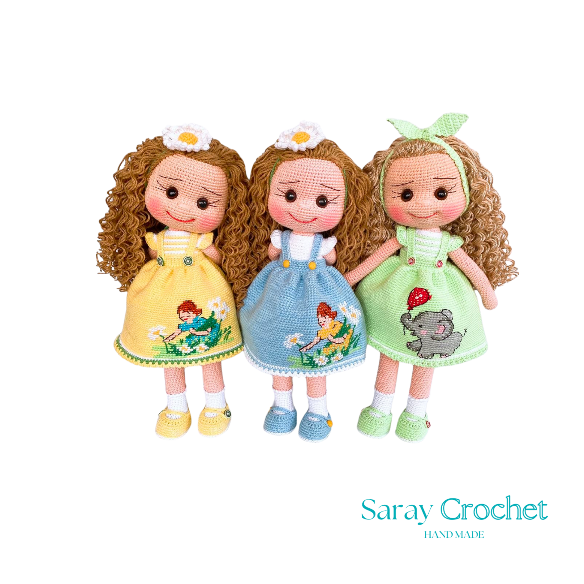 Three handcrafted dolls with curly hair, each wearing a uniquely designed dress in yellow, blue, and green colors.