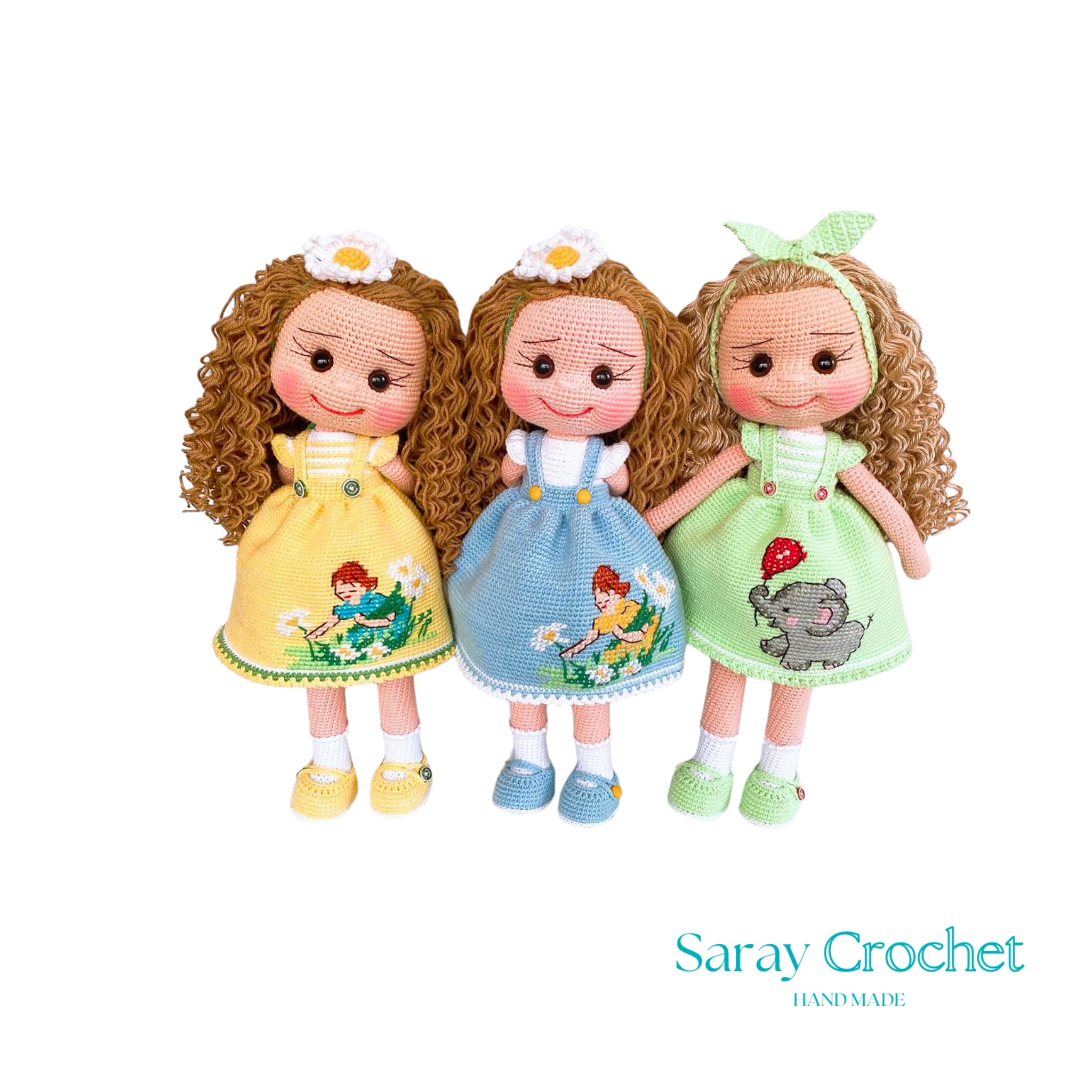 Three handcrafted dolls with curly hair, each wearing a uniquely designed dress in yellow, blue, and green colors.