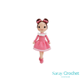 A handcrafted doll with a pink dress and bow, standing 30 cm tall.