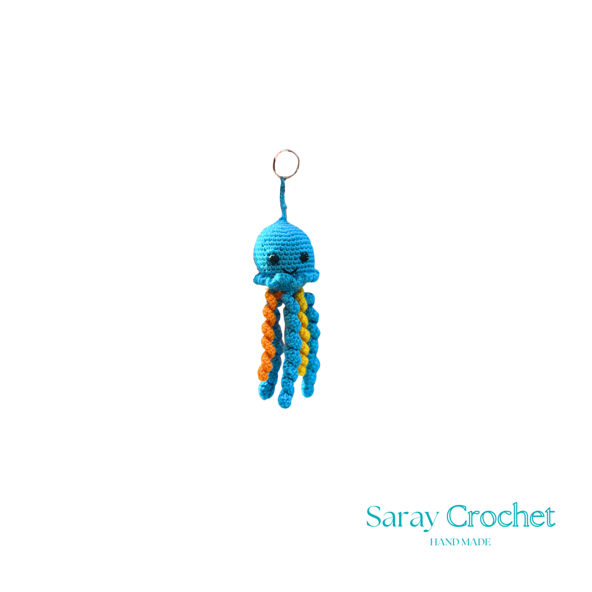 Ručno rađeni privjesak šarene i vesele hobotnice idealan je za djecu i roditelje kao dodatak za torbice i ključeve.