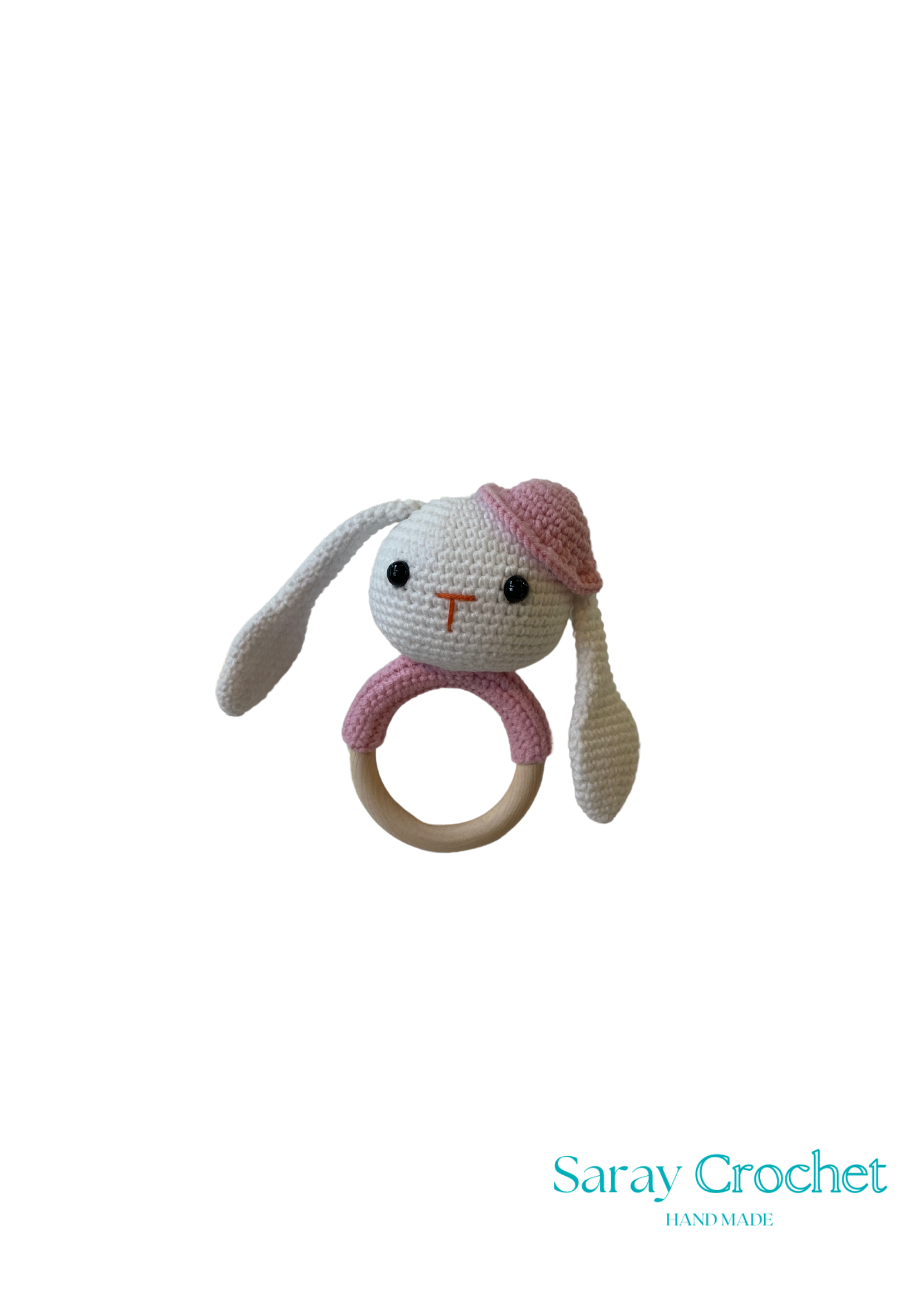 Crocheted bunny rattle with pink bow on a white background, branded 'Saray Crochet'.