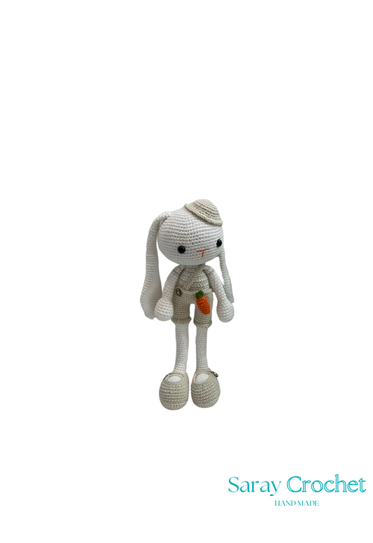 Handmade crochet toy with a plain background, branded 'Saray Crochet'.