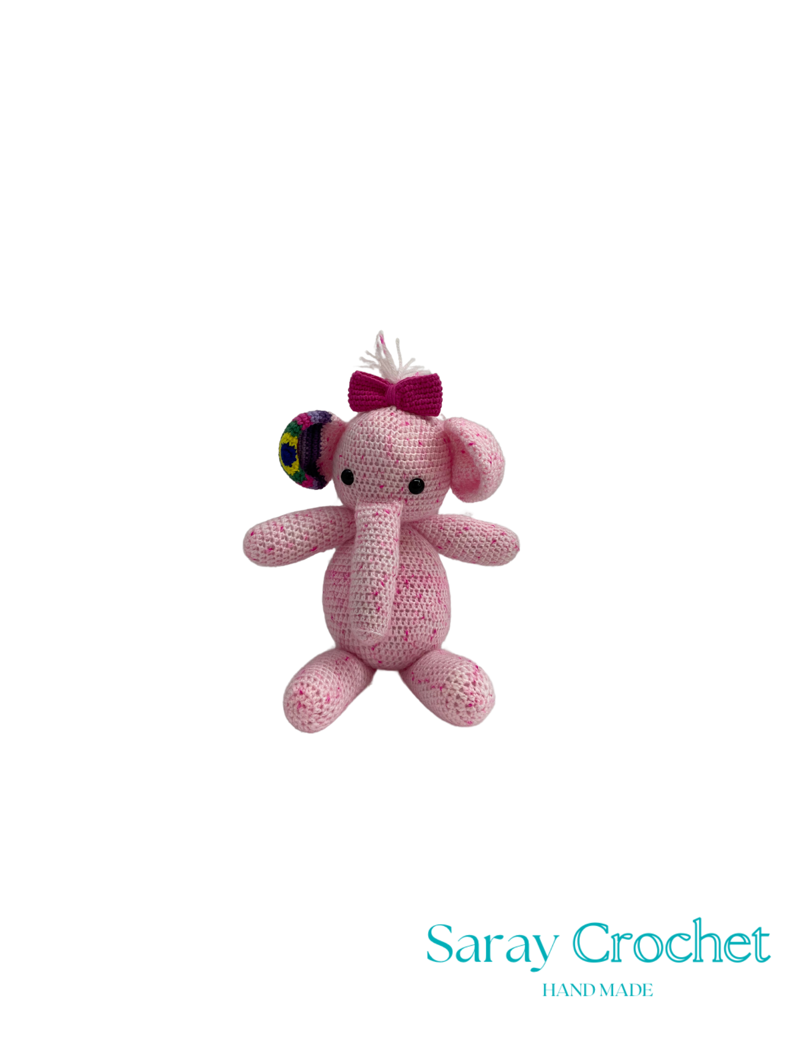 Pink crochet toy with a bow on a white background, branded 'Saray Crochet'.