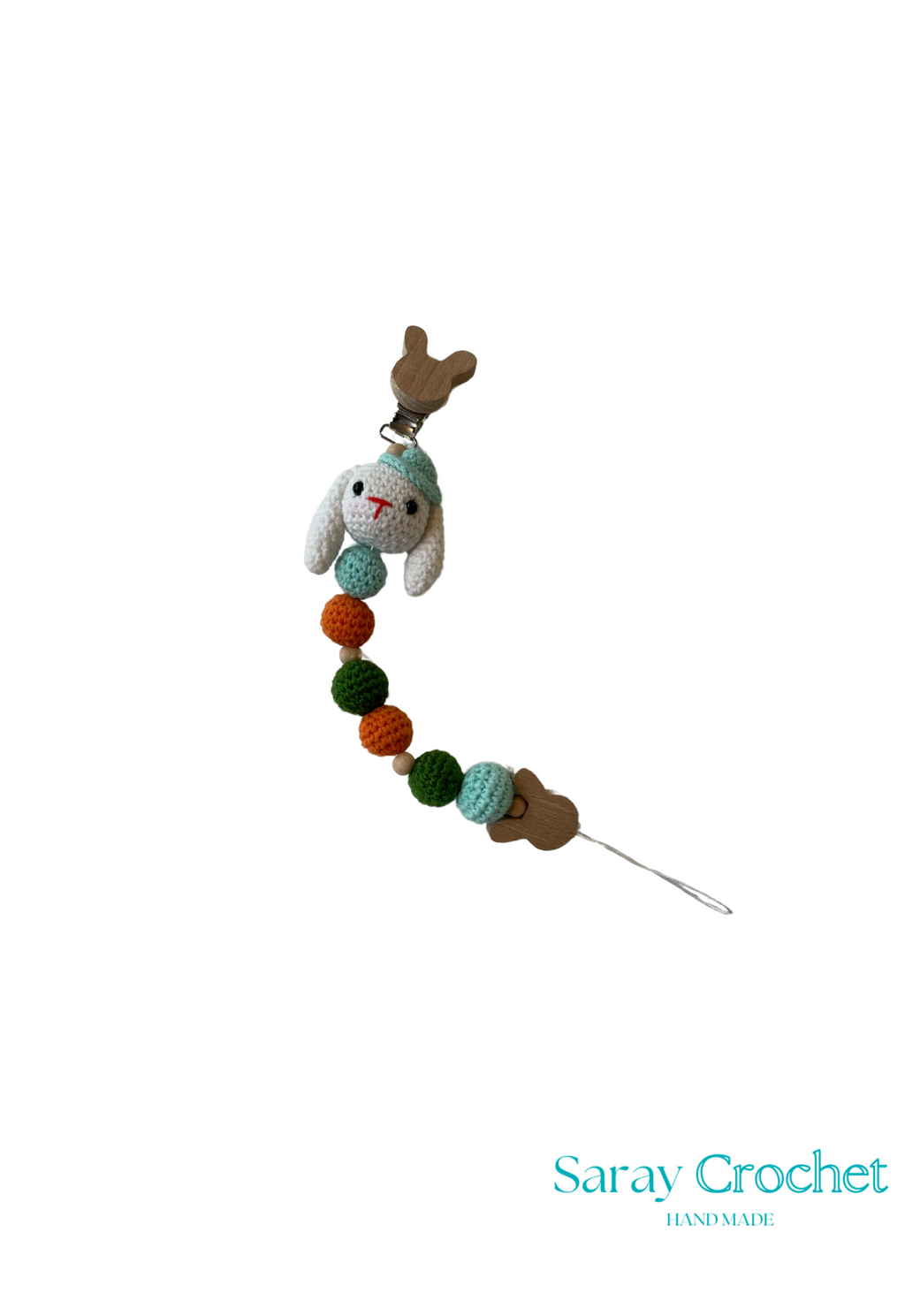 Crocheted cat toy with colorful beads and a small plush rabbit on a white background, branded 'Saray Crochet'.