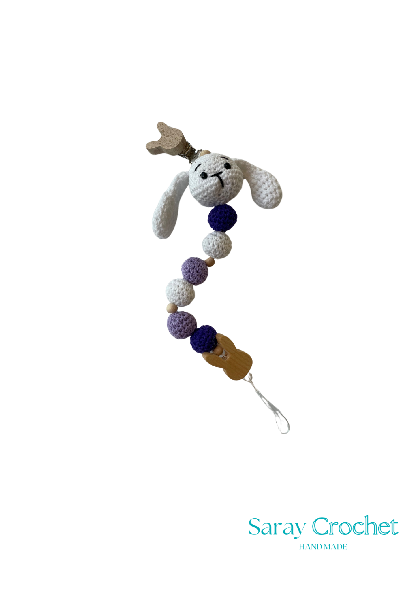 Crocheted toy with bunny face and colorful beads on a white background, branded 'Saray Crochet'.