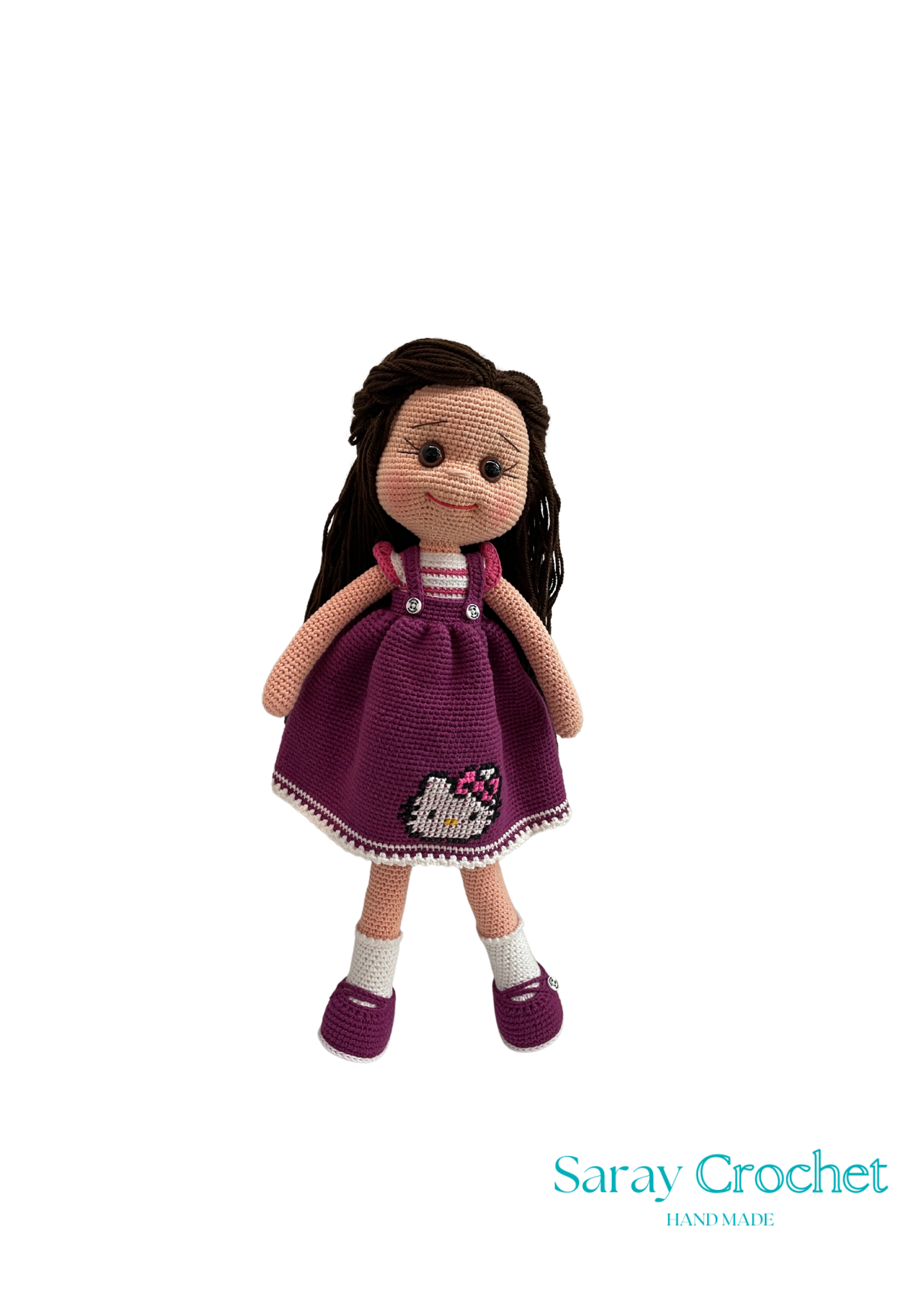 Handmade doll with a dark pink dress featuring a Hello Kitty motif, white shoes, and a matching dark pink bow.