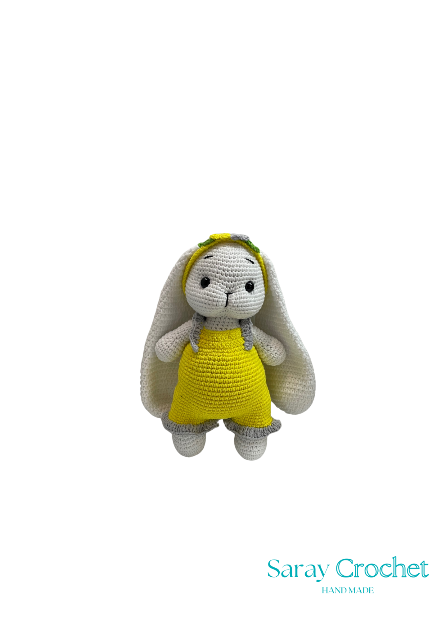 Handmade plush toy resembling a rabbit with a yellow dress and a headband, crafted from cotton, by SarayCrochet.