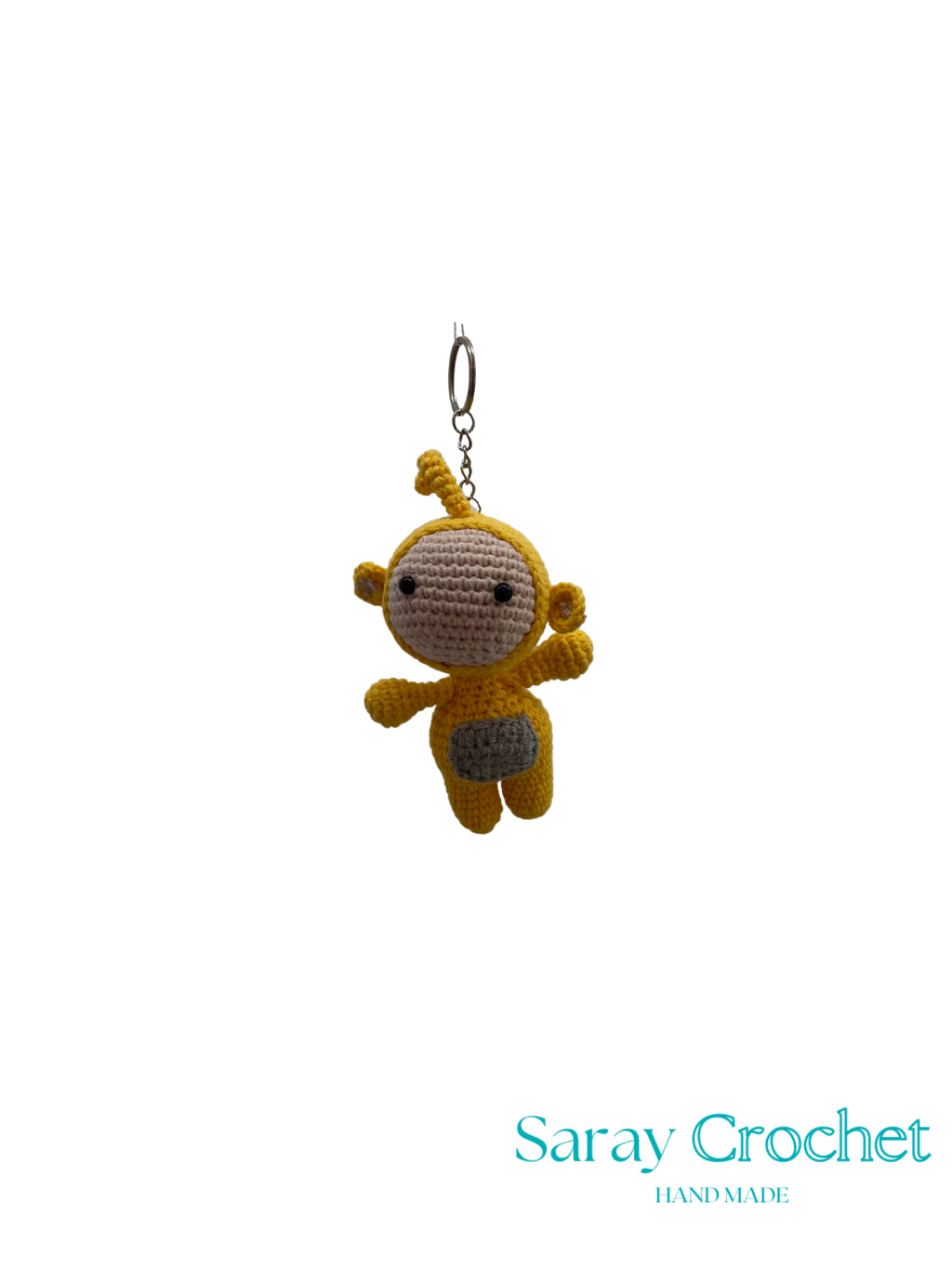 Crocheted character keychain on a white background with 'Saray Crochet' branding.