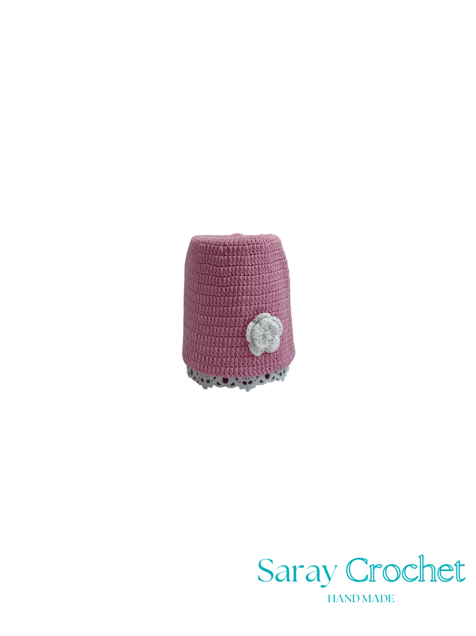 Pink crochet item with a white flower on a white background, branded 'Saray Crochet'.