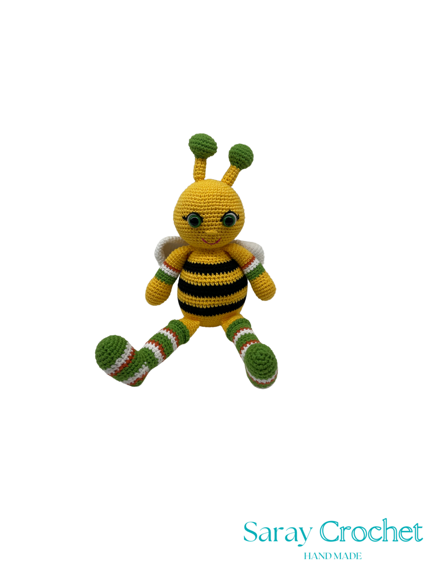 Crocheted bee toy with green hair on a white background, branded 'Saray Crochet'.