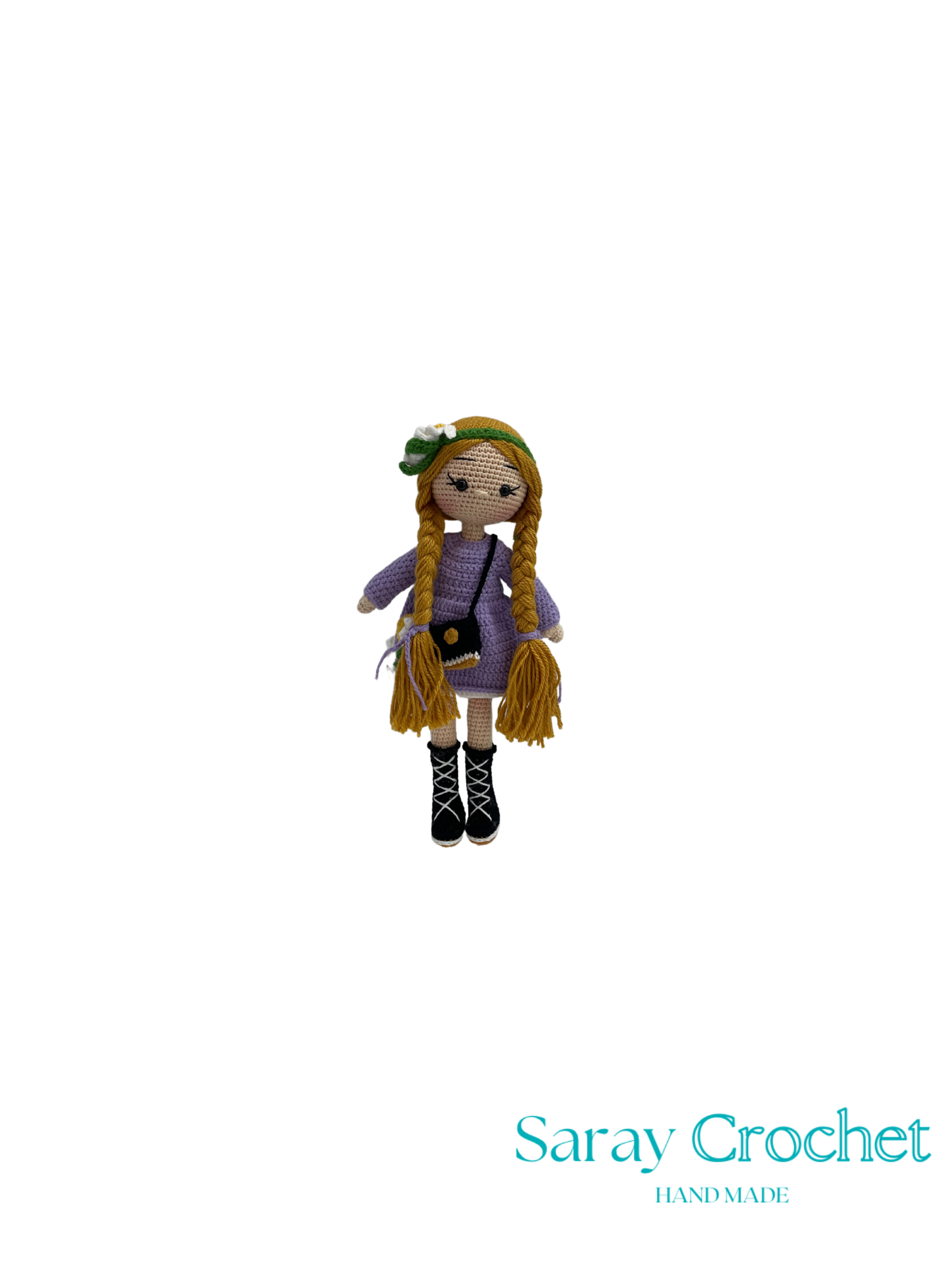 Crocheted doll with long hair and a purple outfit on a white background, branded 'Saray Crochet'.