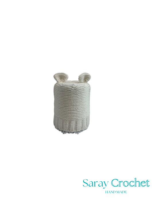 Knitted baby hat with bear ears on a white background, branded 'Saray Crochet'.
