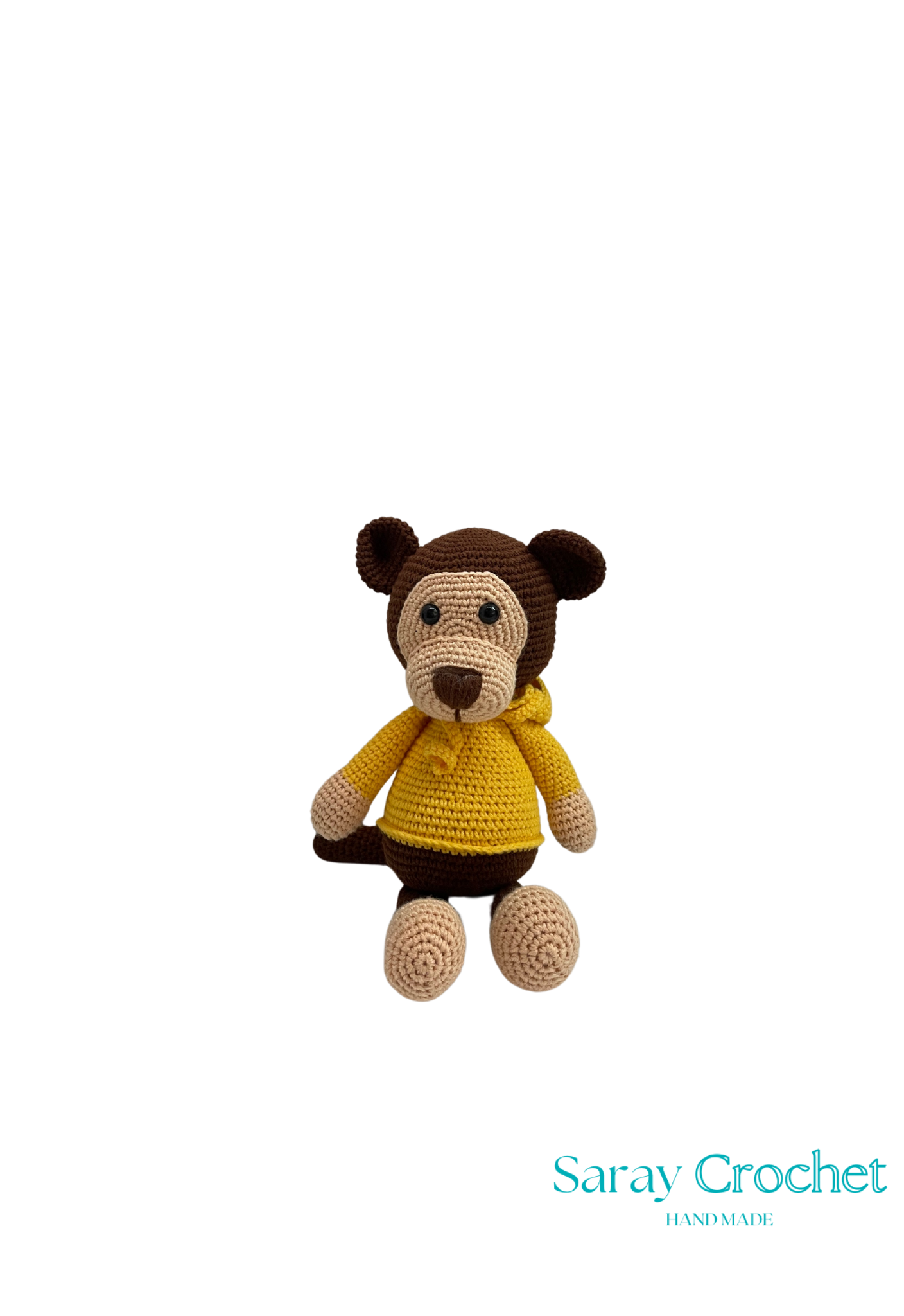 Handmade plush toy resembling a monkey with a yellow shirt and brown details, part of the SarayCrochet collection.