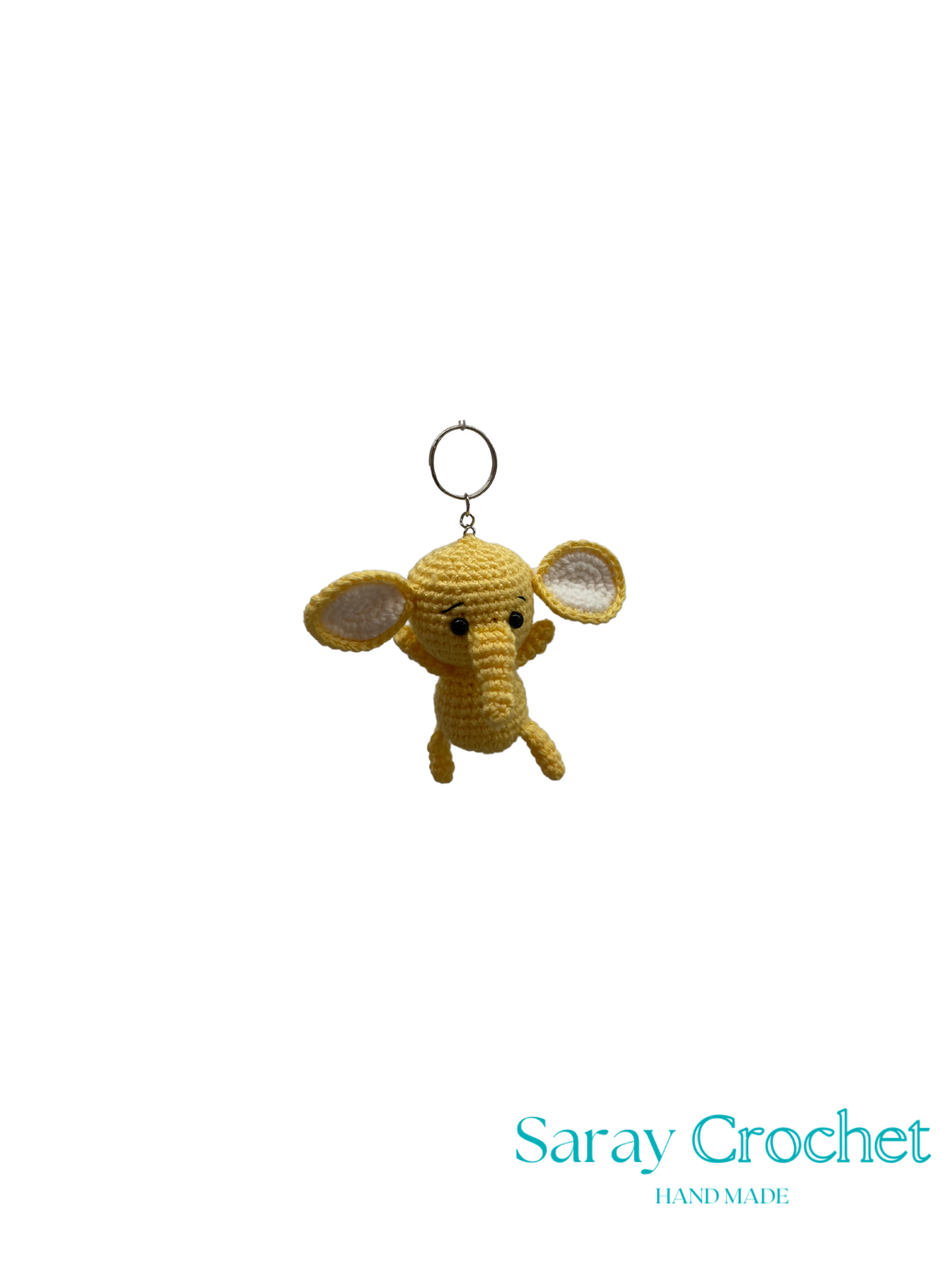 Crocheted elephant keychain on a white background with 'Saray Crochet' branding.