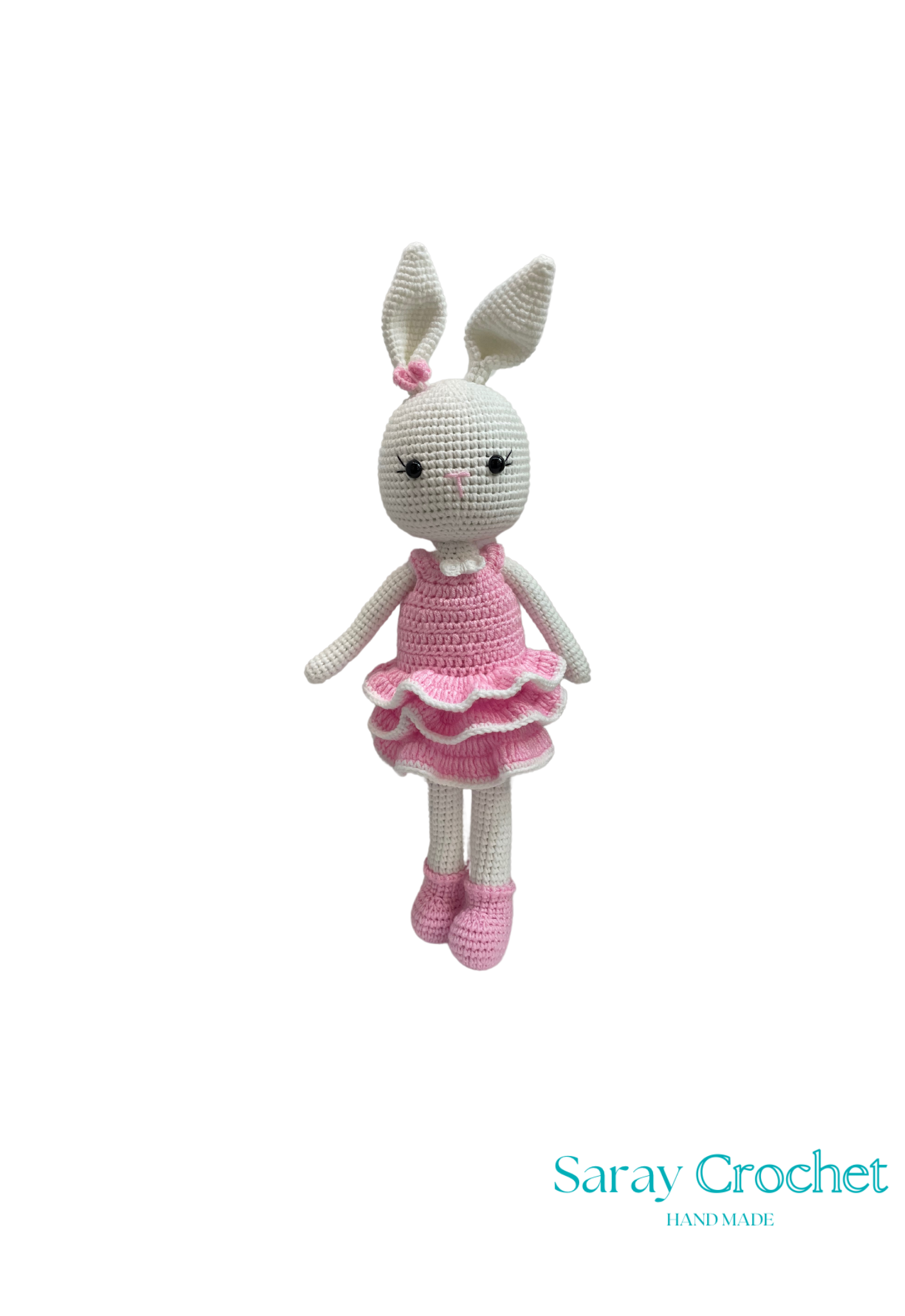 Handmade plush toy resembling a rabbit with a pink and white dress, gray bunny ears, and blue eyes.