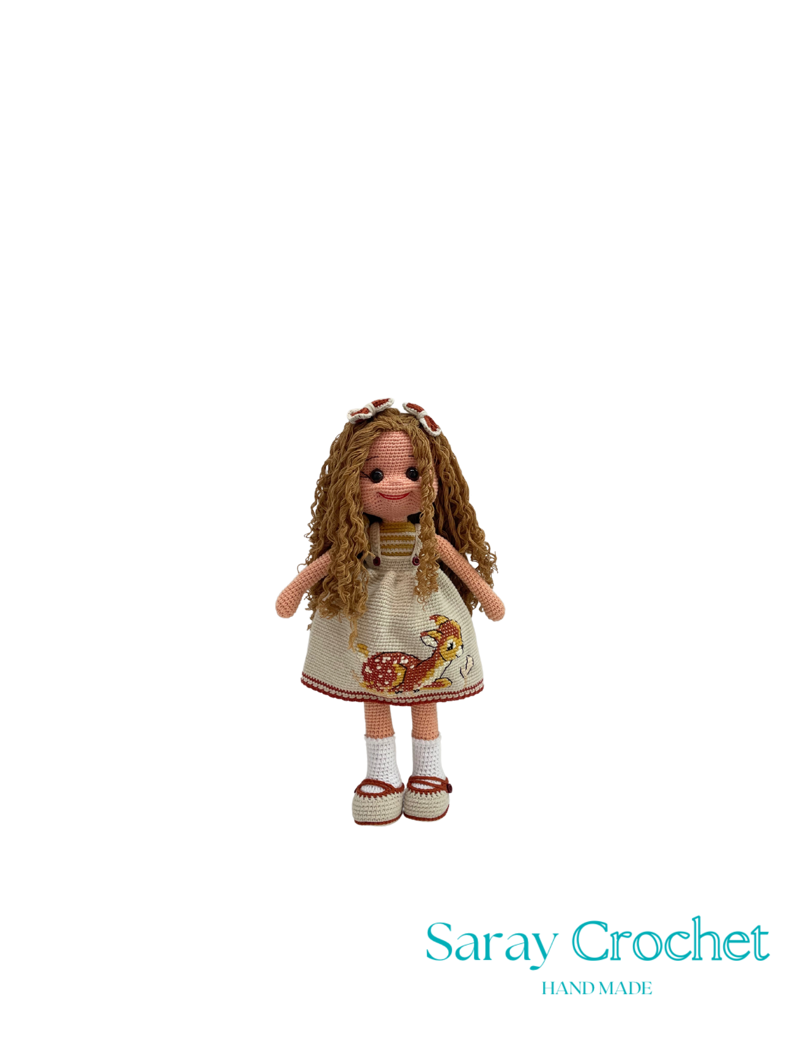 Handmade doll with a dress featuring a turtle design on a white background, branded 'Saray Crochet'.