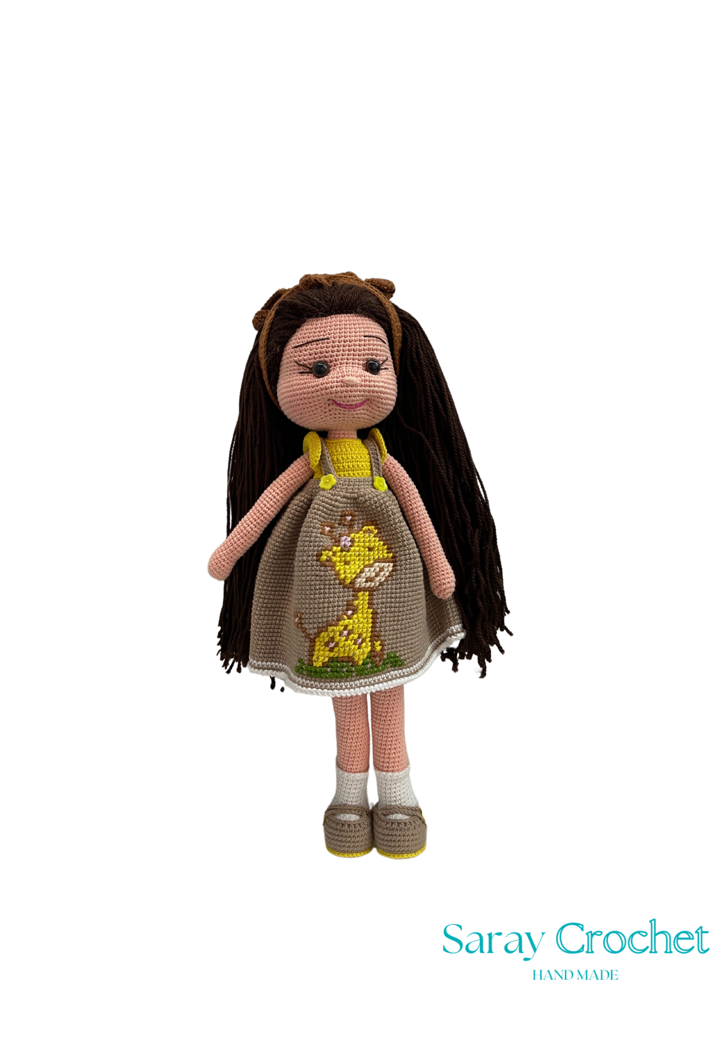 Handmade doll with a giraffe motif on the dress, wearing a headband, and long hair.