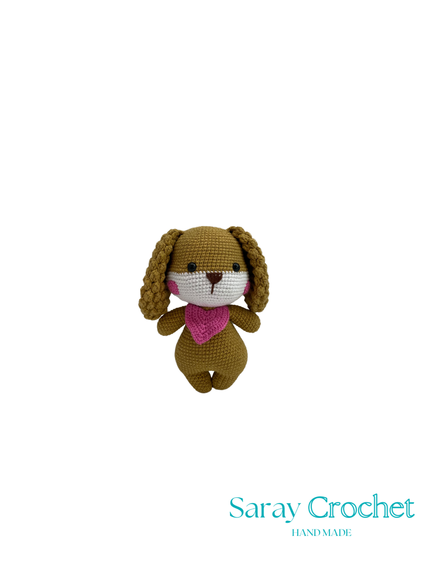 Crocheted dog toy with a pink heart around its neck on a white background, branded 'Saray Crochet'.