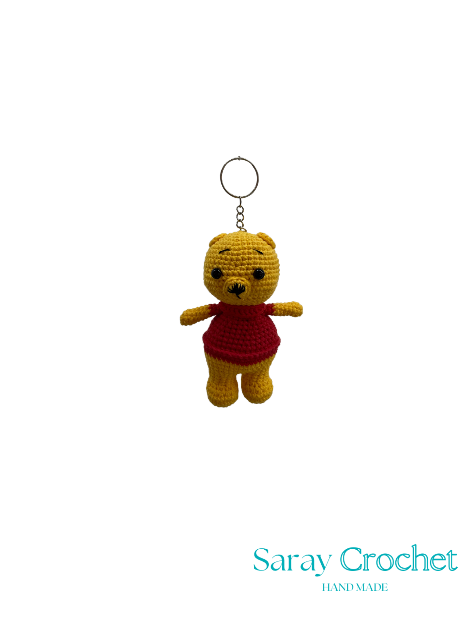 Crocheted bear keychain with red sweater on a white background, branded 'Saray Crochet'.