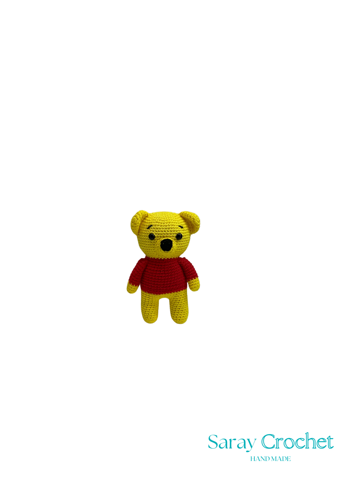 A small yellow and red plush toy designed to look like a bear with a round body and a red shirt, presented against a white background with the text 'Saray Crochet' at the bottom.