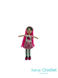 Handmade crochet doll with pink hair and outfit on a white background, branded 'Saray Crochet'.