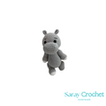 Crocheted hippo toy with 'Saray Crochet' branding on a white background