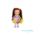 Handmade doll with a floral dress and a fluffy bow in her hair, holding a small yellow bird, with a soft color palette.