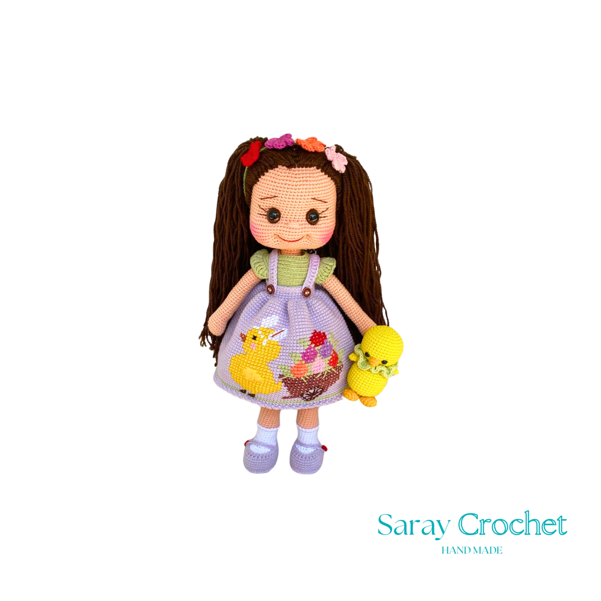 Handmade doll with a floral dress and a fluffy bow in her hair, holding a small yellow bird, with a soft color palette.