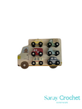 Wooden toy with various vehicle shapes on a white background, branded 'Saray Crochet'.