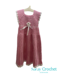 Pink crocheted dress on a white background with 'Saray Crochet' branding.